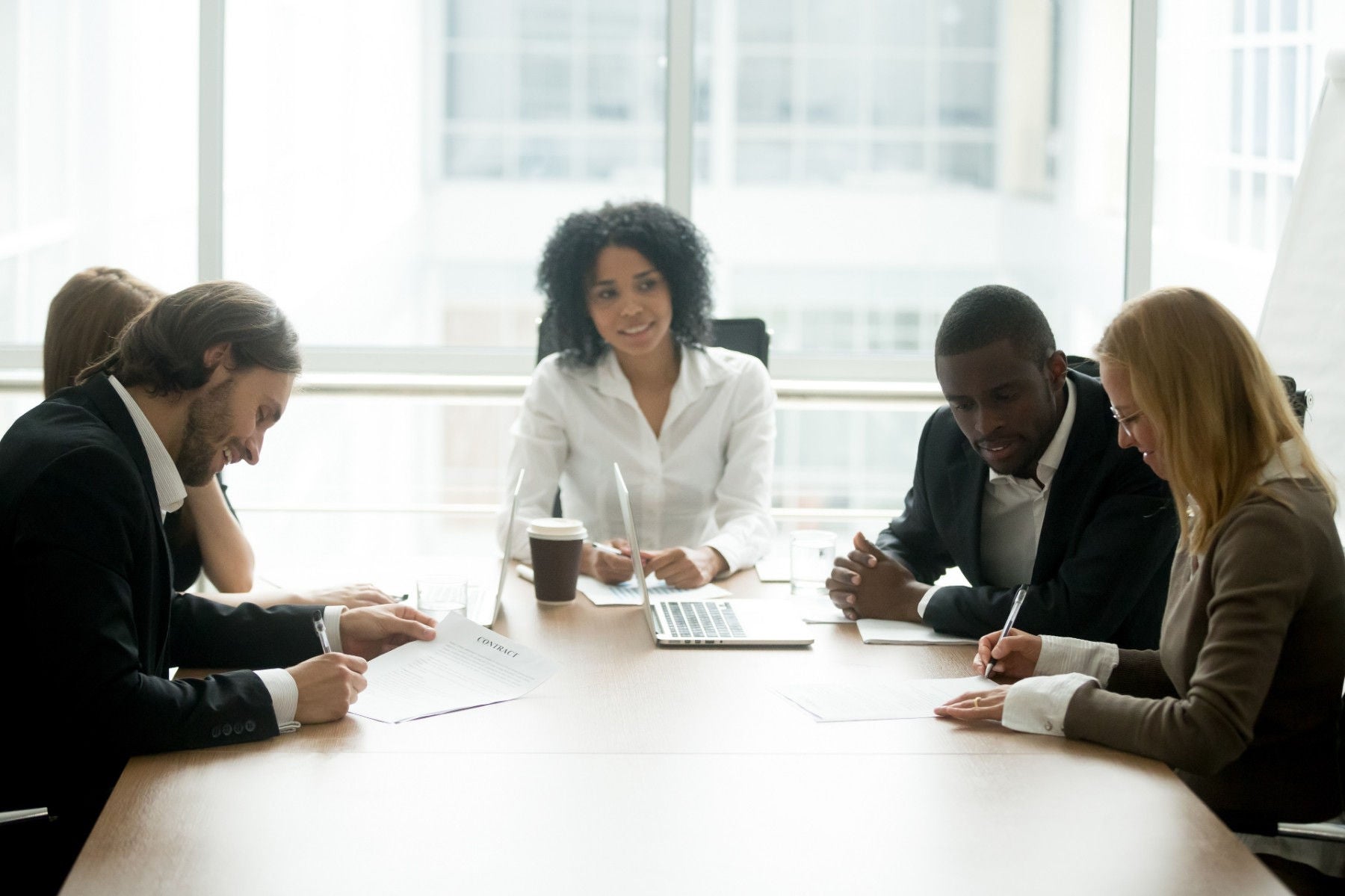 Businesspeople at desk